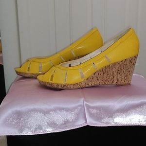 Yellow Nine West 3" open toe wedge sandals